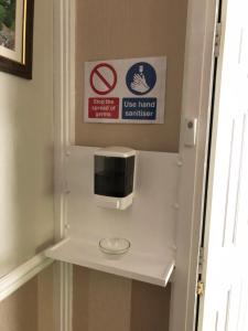 A television and/or entertainment center at Castle Green Bed and Breakfast 