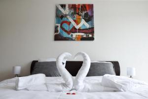 Letto o letti in una camera di Chez Julia