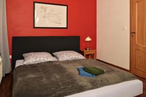 Postelja oz. postelje v sobi nastanitve Apartmány Irisis
