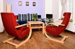 Predel za sedenje v nastanitvi Apartmány Irisis