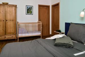 Postel nebo postele na pokoji v ubytování Apartmány Irisis