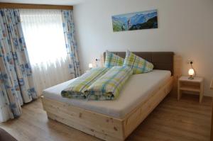 Łóżko lub łóżka w pokoju w obiekcie Ferienwohnung Plattner inklusive Sommercard
