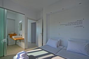 Postel nebo postele na pokoji v ubytování Villa Athena by PosarelliVillas + 12 fotografií