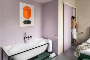 Posteľ alebo postele v izbe v ubytovaní Hotel Unplugged