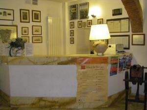Fotografie z fotogalerie ubytování Albergo Cannon d'Oro v Sieně