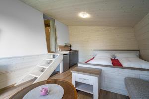 Posteľ alebo postele v izbe v ubytovaní Apartmány Chata Jedlová hora