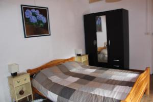 Postel nebo postele na pokoji v ubytování La Pyrène Maison de vacances