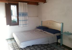 Postel nebo postele na pokoji v ubytování Sa Domu e Crakeras