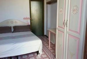 Postel nebo postele na pokoji v ubytování Sa Domu e Crakeras