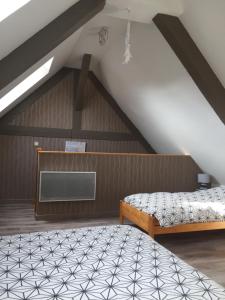 Postel nebo postele na pokoji v ubytování Appartement duplex chez Sandra