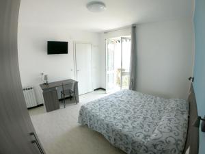 Postel nebo postele na pokoji v ubytování Hotel Aurora + 37 fotografií