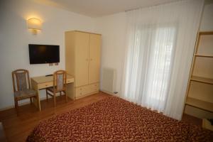 TV a/nebo společenská místnost v ubytování Hotel Canada