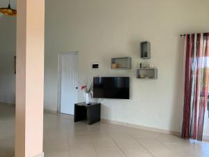 TV a/nebo společenská místnost v ubytování Caleton Group