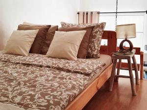Кровать или кровати в номере Charming Studio