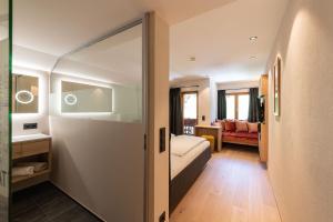Voodi või voodid majutusasutuse Hotel Bradabella - Montafon toas