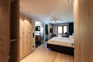 Voodi või voodid majutusasutuse Hotel Bradabella - Montafon toas