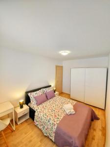 Posteľ alebo postele v izbe v ubytovaní Tusculum apartment Solin