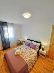 Posteľ alebo postele v izbe v ubytovaní Tusculum apartment Solin