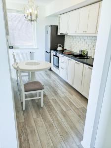 Η κουζίνα ή μικρή κουζίνα στο Apartament AMMA - De Luxe - Free Parking