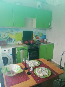
Кухня или мини-кухня в Apartment 2-ya Yuzhnaya
