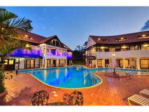 a large swimming pool in front of a building at Kunigami-gun - Hotel - Vacation STAY 89678 in Inbu