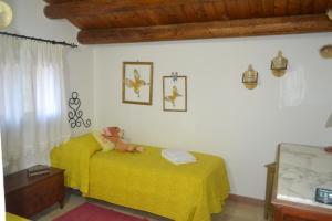 Posteľ alebo postele v izbe v ubytovaní Villa Paradiso Riserva Naturale Monte Cofano