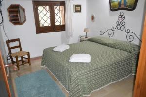 Posteľ alebo postele v izbe v ubytovaní Villa Paradiso Riserva Naturale Monte Cofano