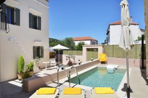 The swimming pool at or close to Villa Stylianna