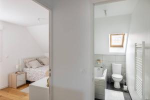 Koupelna v ubytování GRAND CONFORT, Appartement Osny
