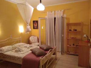 Posteľ alebo postele v izbe v ubytovaní Spiti Mitsis
