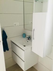 Kúpeľňa v ubytovaní Apartament Orhidea