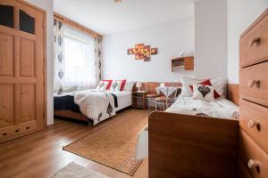Postel nebo postele na pokoji v ubytování Willa Wrzos