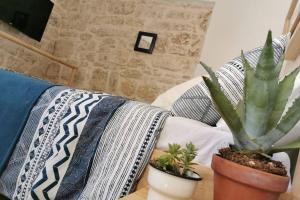 سرير أو أسرّة في غرفة في Casa Porta Verde