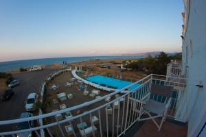 a balcony of a building with a view of the ocean at Yachting Club Mare in Patti