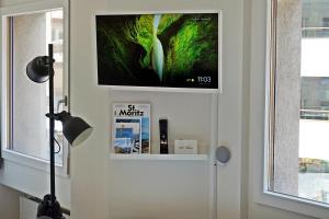 TV a/nebo společenská místnost v ubytování Charmantes, gemütliches Studio, im Zentrum - C2