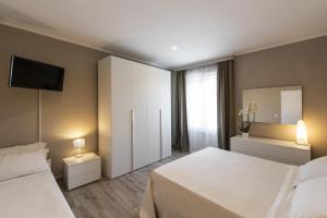 Letto o letti in una camera di Gli Archi Spoleto