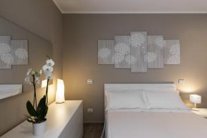 Letto o letti in una camera di Gli Archi Spoleto