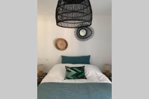 Postel nebo postele na pokoji v ubytování Appartement neuf sur Plage de Calvi Vue Mer