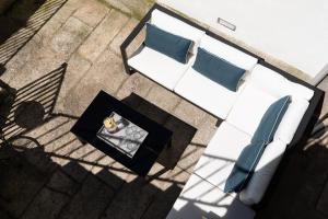 Ein Sitzbereich in der Unterkunft Gallery Townhouse & Home