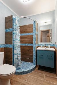 Koupelna v ubytování YUDGI - Home Hotel + 37 fotografií