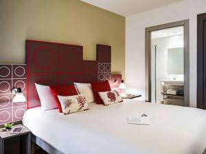 מיטה או מיטות בחדר ב-ibis Styles Barcelona Centre