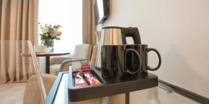 Příslušenství pro přípravu čaje a kávy v ubytování Hotel KOZÁK
