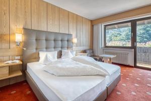 Postel nebo postele na pokoji v ubytování Hotel Klarnerhof + 37 fotografií