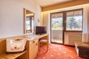 TV a/nebo společenská místnost v ubytování Hotel Klarnerhof
