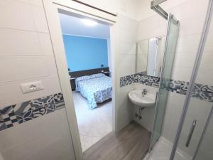 Koupelna v ubytování Hotel Aurora