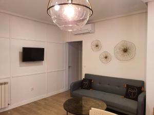 TV a/nebo společenská místnost v ubytování Hotel Complejo París