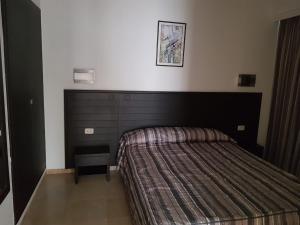 Postel nebo postele na pokoji v ubytování Andalucia appart hoteL