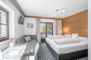Posteľ alebo postele v izbe v ubytovaní Corso`s Annabell - Bed & Breakfast