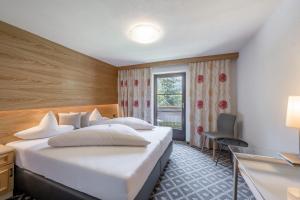 Posteľ alebo postele v izbe v ubytovaní Corso`s Annabell - Bed & Breakfast