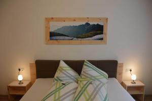 Łóżko lub łóżka w pokoju w obiekcie Ferienwohnung Plattner inklusive Sommercard